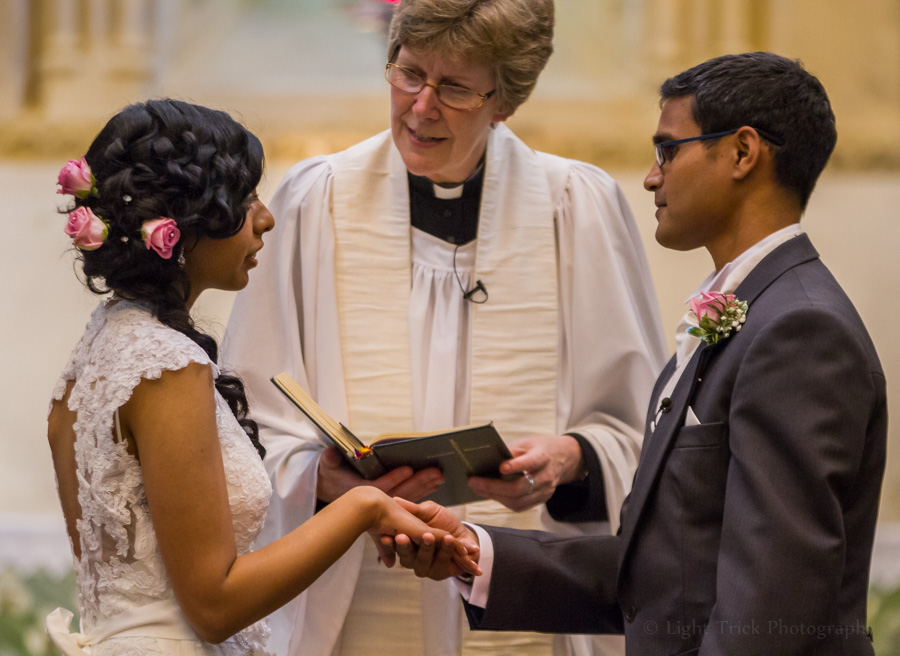 bride and groom exchanging vows